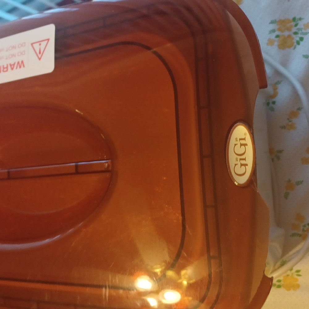 GiGi Wax WARMER.  With wax included. Works Perffect.